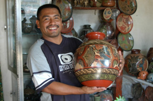 person holding a pot